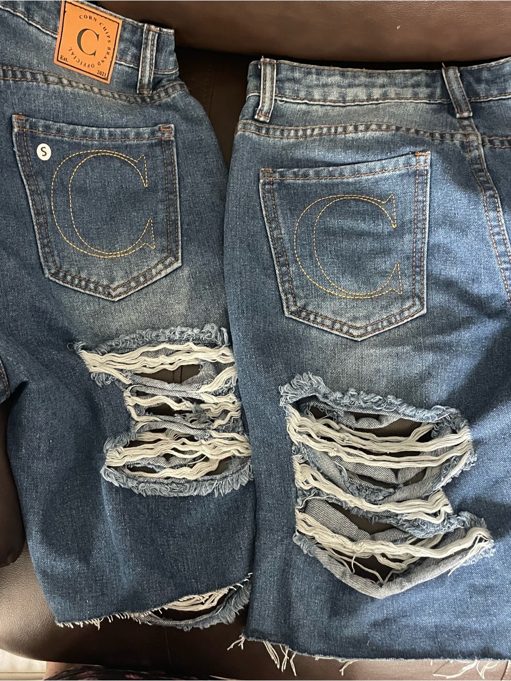Corkys Distressed Blue Denim Jean Shorts with Signature C Back Pocket